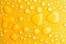 Water Drops Yellow Background