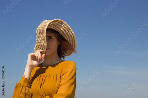 Beautiful Woman With Pink And Short Hair Wearing Sun Hat And