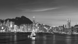 Fototapeta  - Panorama of Victoria Harbor of Hong Kong city at dusk