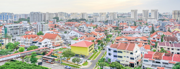 Wall Mural - Panorama residential house with high-rise buildings in background in Singapore