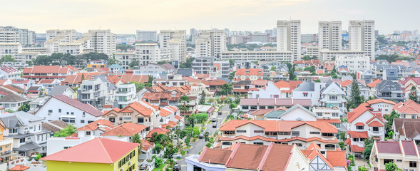 Wall Mural - Panorama residential house with high-rise buildings in background in Singapore