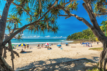Wall Mural - noosa, australia, feb 17 2018: people enjoying summer at noosa main beach - a famous tourist destina