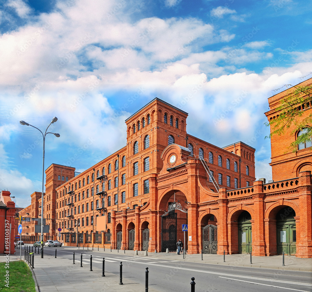 Genuine industrial architecture, with unplastered red brick buildings - obrazy, fototapety, plakaty 