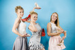 © anetlanda - Three women showing high heels shoes