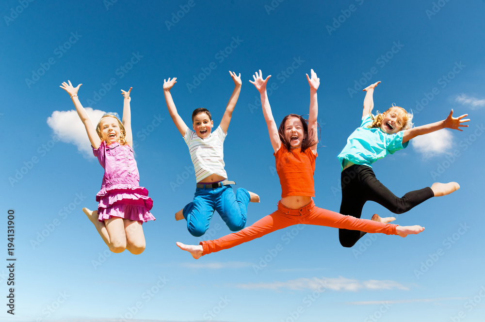 Happy active children jumping - obrazy, fototapety, plakaty 