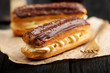 Traditional french eclairs with chocolate.
