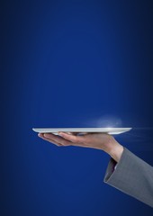 Poster - Hand holding tablet with blue background