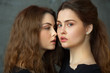 © Alexandr - portrait of two beautiful young girls of twin sisters with flowing hair