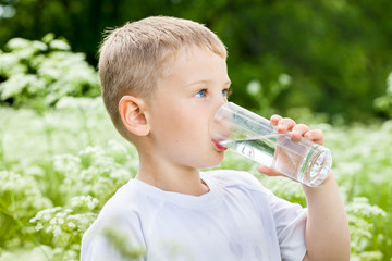 Child drinking pure water