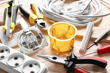 Different electrical tools on table