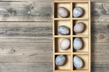 Wall Mural - Natural dyed grey Easter eggs