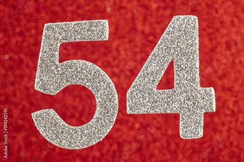 Fotografia Number fifty-four blue over a silver background