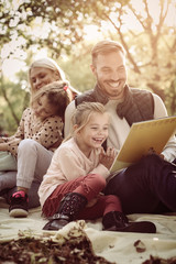 Wall Mural - Family in park.