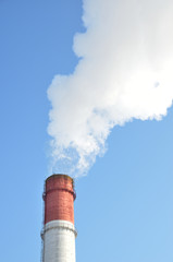 Smoke from the factory pipe. In fact, smoke passes through electrical filters and leaves the pipe, after cleaning, more like steam.