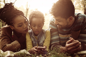 Wall Mural - African American family in nature.