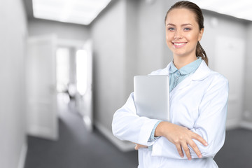 Wall Mural - Smiling medical woman doctor