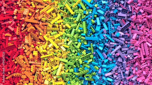 Photographie Lot of colorful rainbow toy bricks background