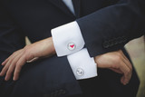 Fototapeta Pomosty - love cufflinks