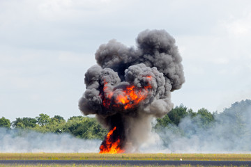 fire ball explosion with black smoke