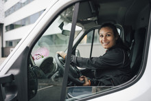 Delivery Woman Driving Truck