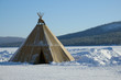Winter polar landscape with eskimo tent.