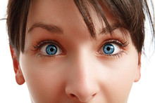 Closeup Of Blue Eyes Of Young Woman