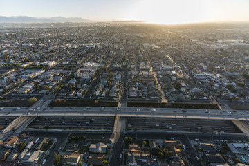 Wall Mural - Early morning aerial view of the double decked Harbor 110 Freeway at 52nd Street south of downtown Los Angeles in Southern California.