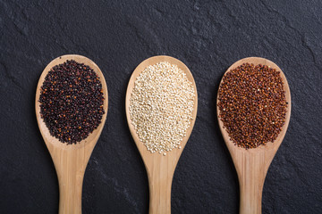 Canvas Print - Black , white and red quinoa in spoon