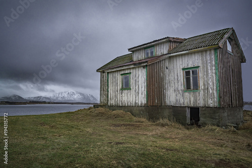 View of old wooden house on...