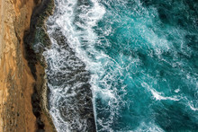Aerial View Of Ocean Waves On Cliff 