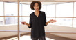 © Mark Adams - Casual black woman standing teaching speech