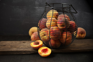 Canvas Print - Ripe peaches in basket