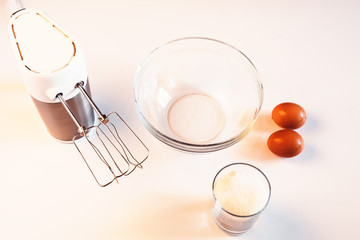 mixer for the dough on white table