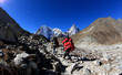 Nepalese carrying Luggage trekking on the way to everst base camp,nepal