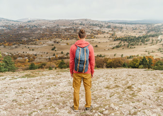 Poster - Male explorer walking outdoor.