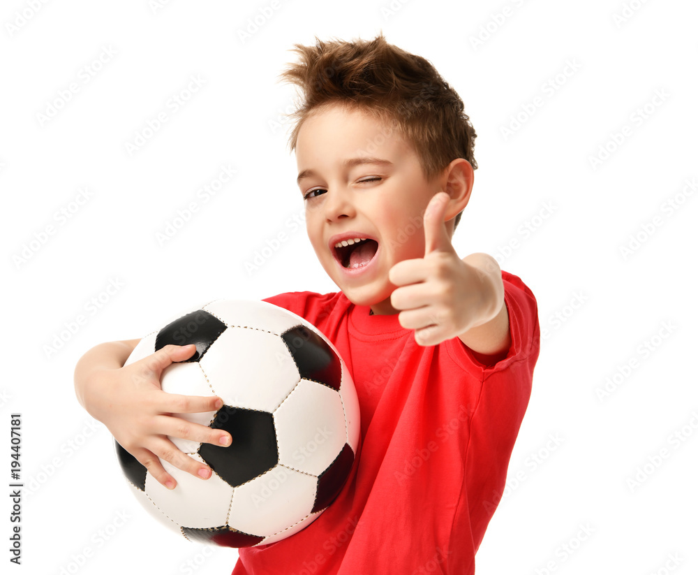 Fan sport boy player hold soccer ball in red t-shirt celebrating happy smiling laughing show thumbs up success sign - obrazy, fototapety, plakaty 