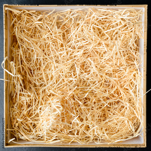 Fotografie, Obraz Composition with decorative straw in a box, close-up