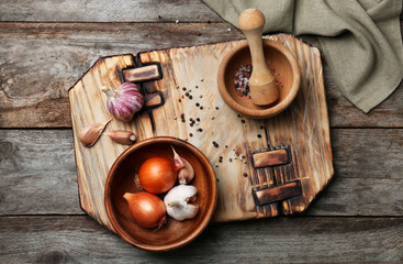 Canvas Print - Wooden kitchen utensils with ingredients on table