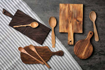 Canvas Print - Wooden kitchen utensils on grey background