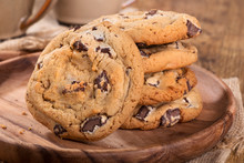 Closeup Of Chocolate Chip Cookies On A Wooden Plate
