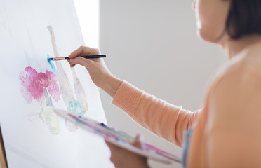 Wall Mural - artist with palette and brush painting at studio