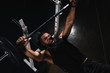 © LIGHTFIELD STUDIOS - high angle view of young african american sportsman lifting barbell