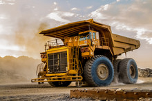 Mining Dump Trucks Transporting Platinum Ore For Processing