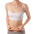 © Kabardins photo - Young beautiful woman in a white T-shirt top of the hand on the belly excess weight of a skin beauty medicine