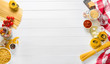 © tan4ikk - Italian raw pasta on wooden background