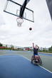Active disabled athlete practicing wheelchair basketball