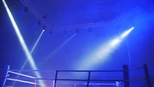 Boxing Ring In Lights Of Projectors Before Fight Night