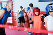 Children training on boxing ring