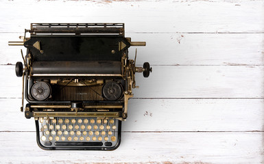 Vintage typewriter header. retro machine technology - top view and creative flat lay design.