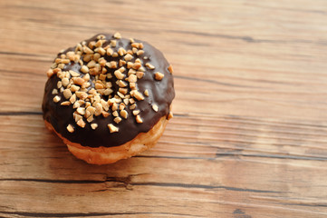 Wall Mural - A delicious doughnut covered in peanut sprinklers